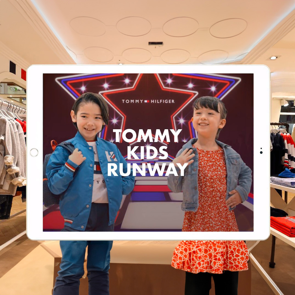 TOMMY KIDS RUNWAY デジタル上でファッションショーを疑似体験できるARアプリ。好きなアイテムを試着したお子様が店舗内を歩く姿を撮影し、お好みで音楽やエフェクトを選ぶと、華やかなランウェイを歩くお子様のムービーを作成することが出来る。”TOMMY HILFIGER KIDS COLLECTION”の2020秋・2021春に合わせ、全国のトミーヒルフィガー キッズ取り扱い店舗で実施。HOLIDAY STUDIOはアプリの技術検証・デザイン・開発を担当した。
